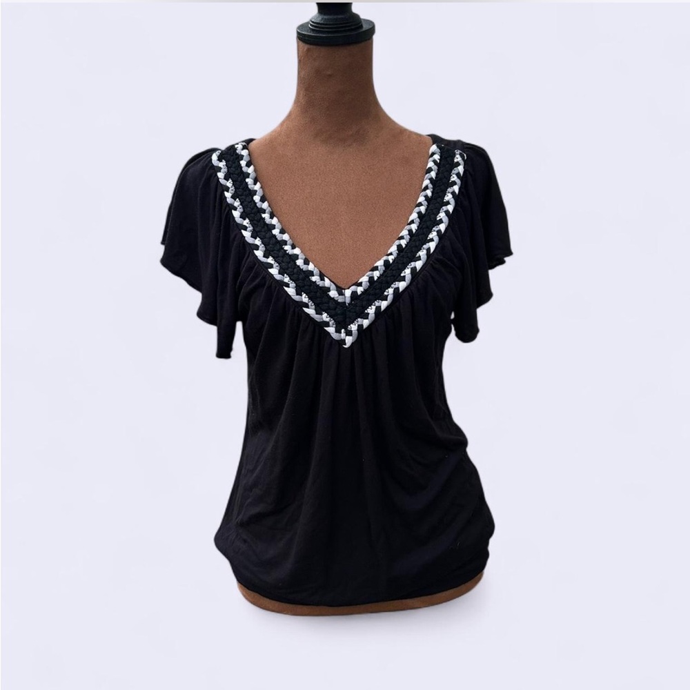 Wrapper black v-neck top with braided trim, banded bottom & ruffle sleeves